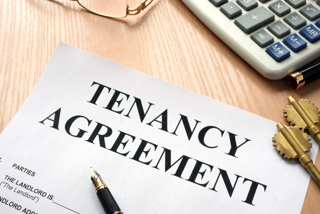 Landlord Tenant Tenancy agreement and keys from home.